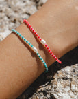 Perlenarmband Mutiara rosa-orange