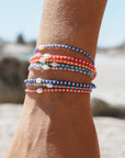 Perlenarmband Mutiara blau-orange
